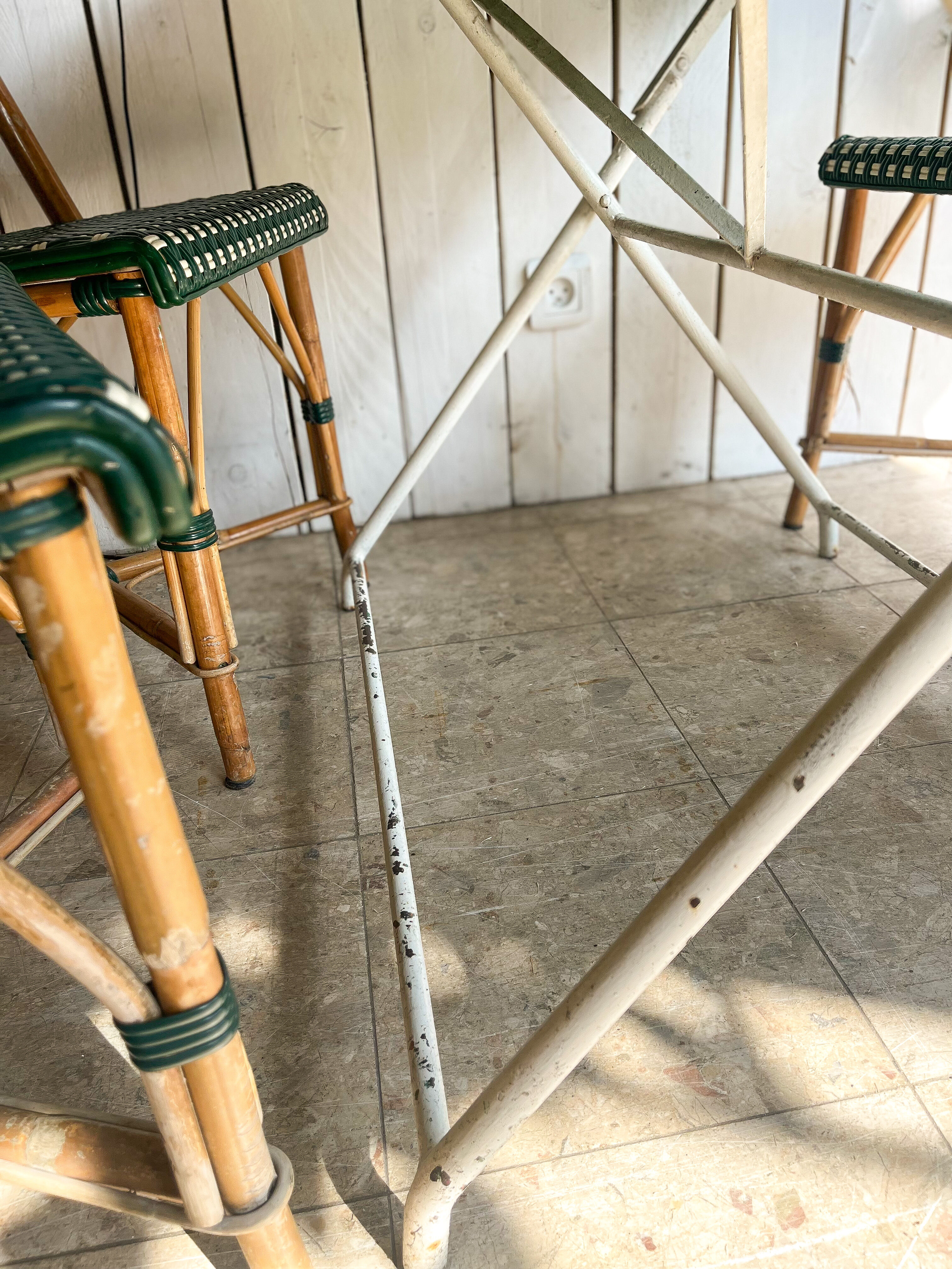 White folding metal bistro table