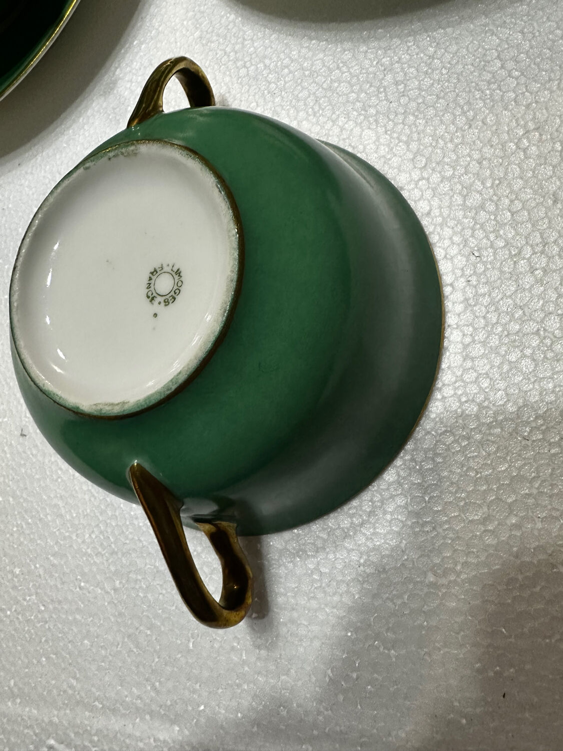 Service 14 cup and saucer in Art Deco Emerald Green and Gold.