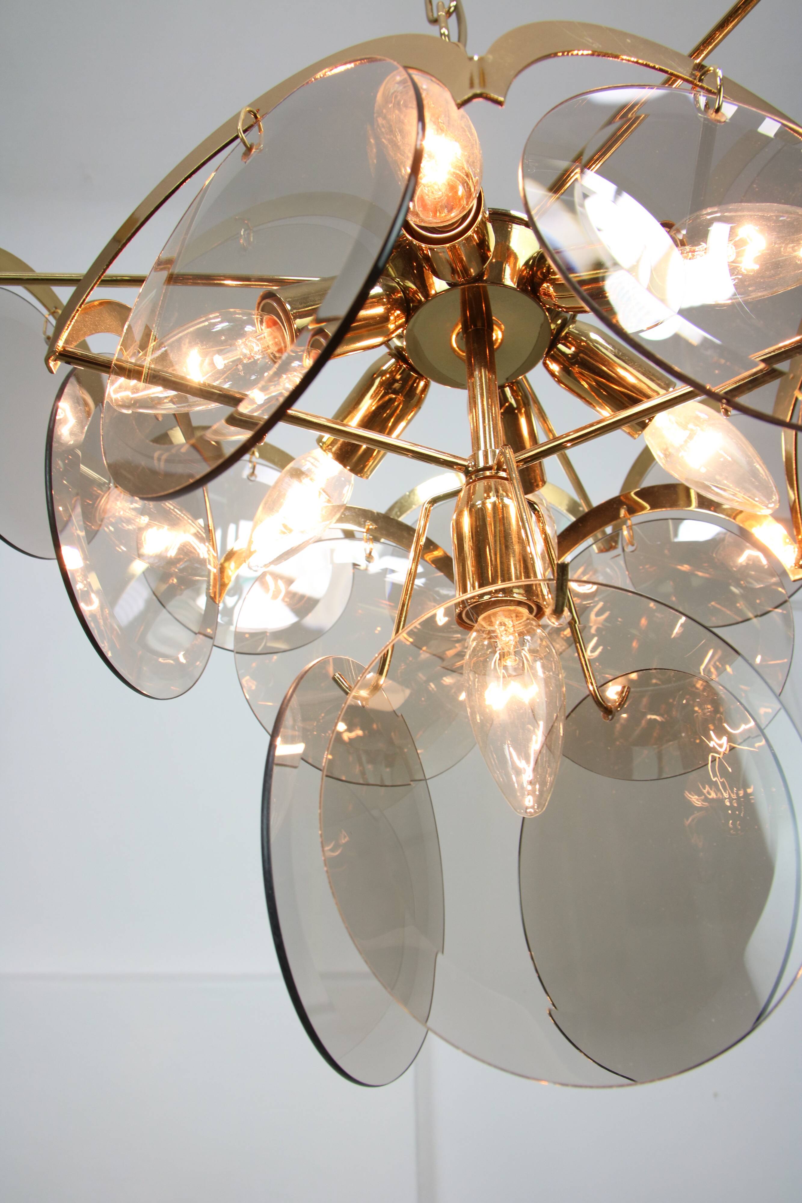 Vintage Vistosi Chandelier: Smoked Glass Discs, Gold Metal, 1970s Italian P