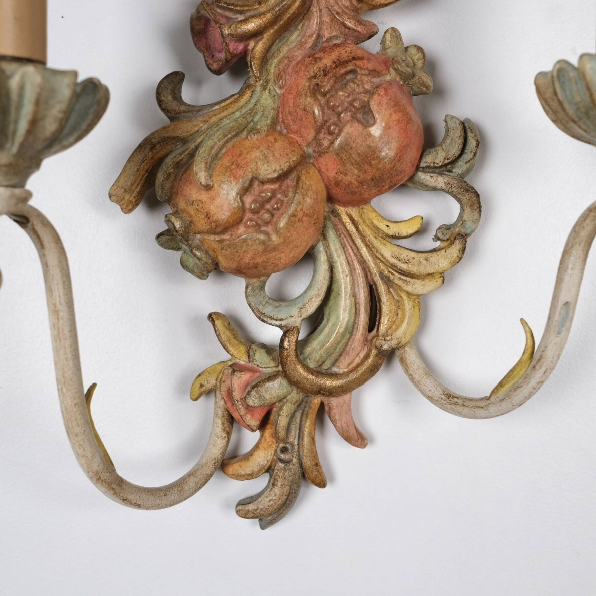 Pair of carved wood and metal sconces, Chelini FIrenze, Italy