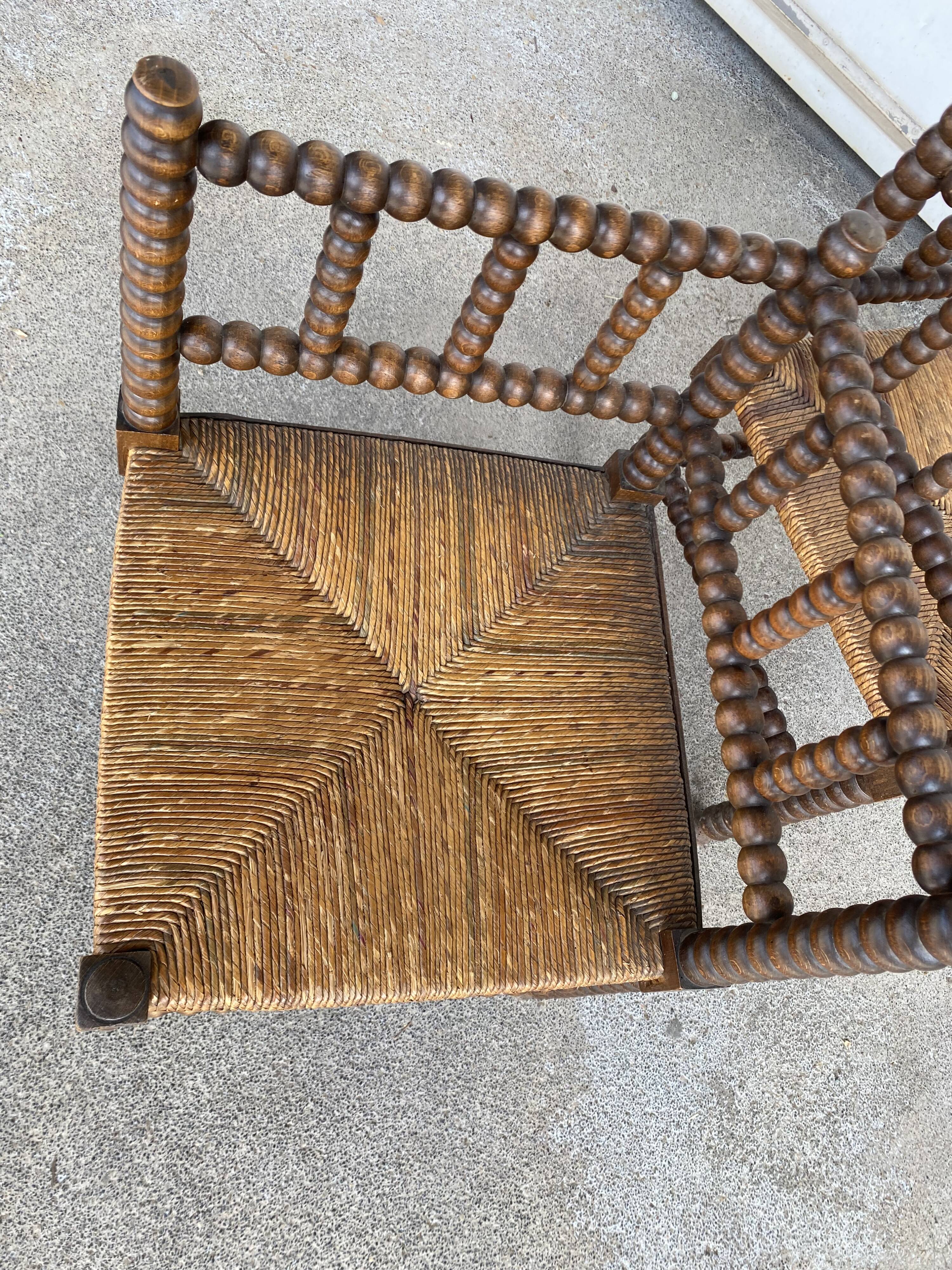 Pair of beaded armchairs