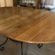 Extendable table in solid oak with wrought iron legs.