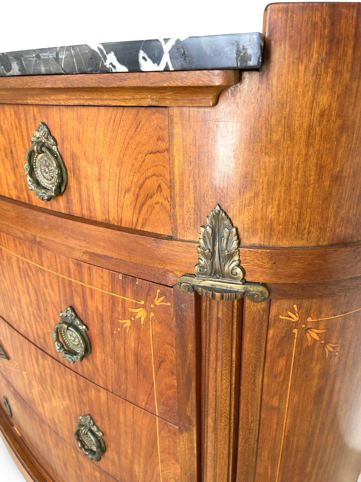 The demi-lune commode/ chest of drawers