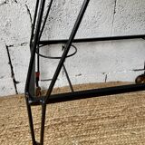 Black lacquered metal and glass serving table