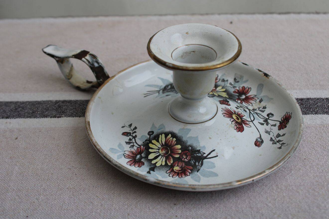 Antique enamel candle holder