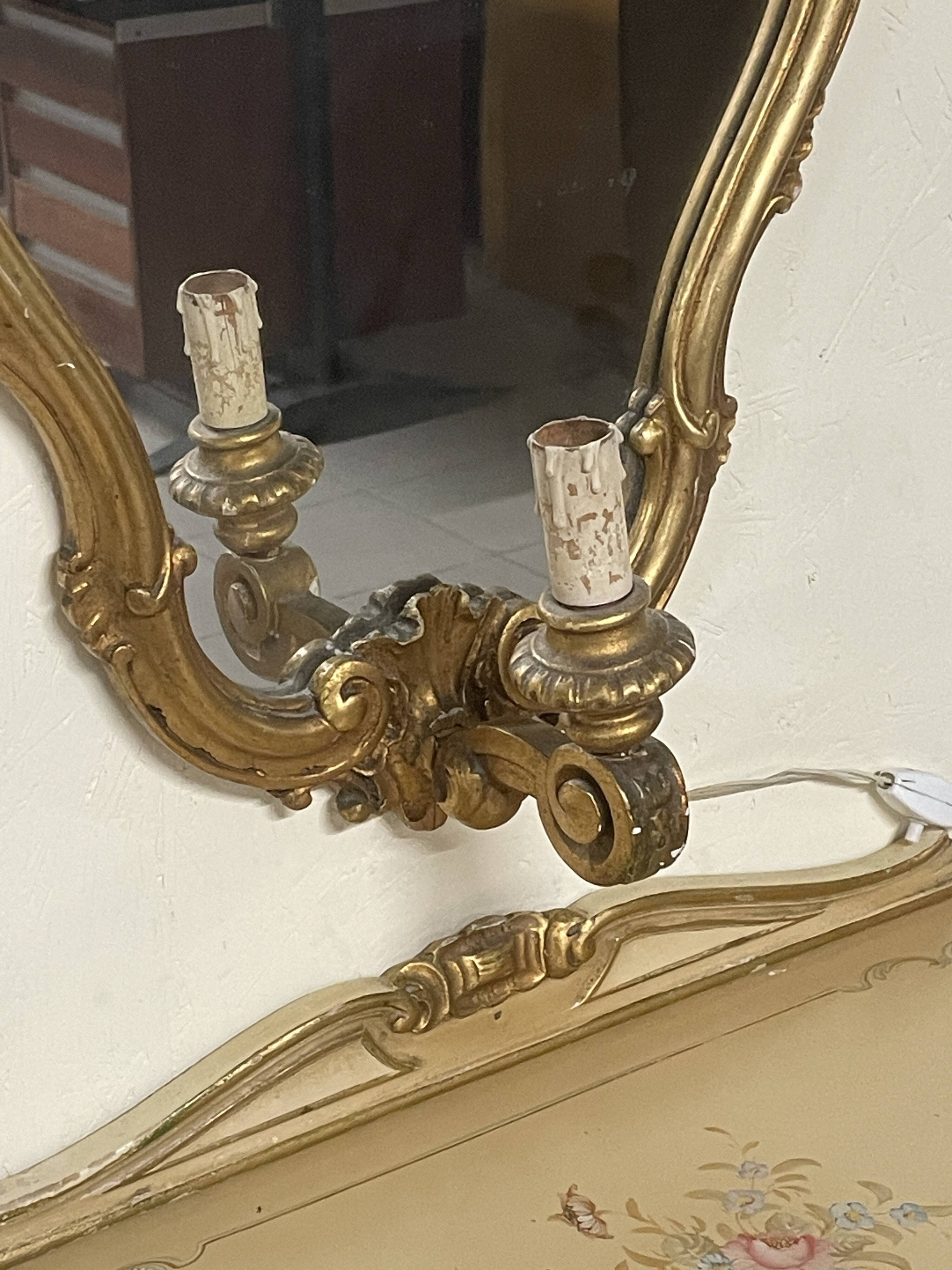 Pair of wall-mounted consoles with a mirror in Louis XV style.