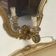 Pair of wall-mounted consoles with a mirror in Louis XV style.