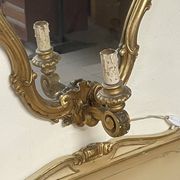 Pair of wall-mounted consoles with a mirror in Louis XV style.
