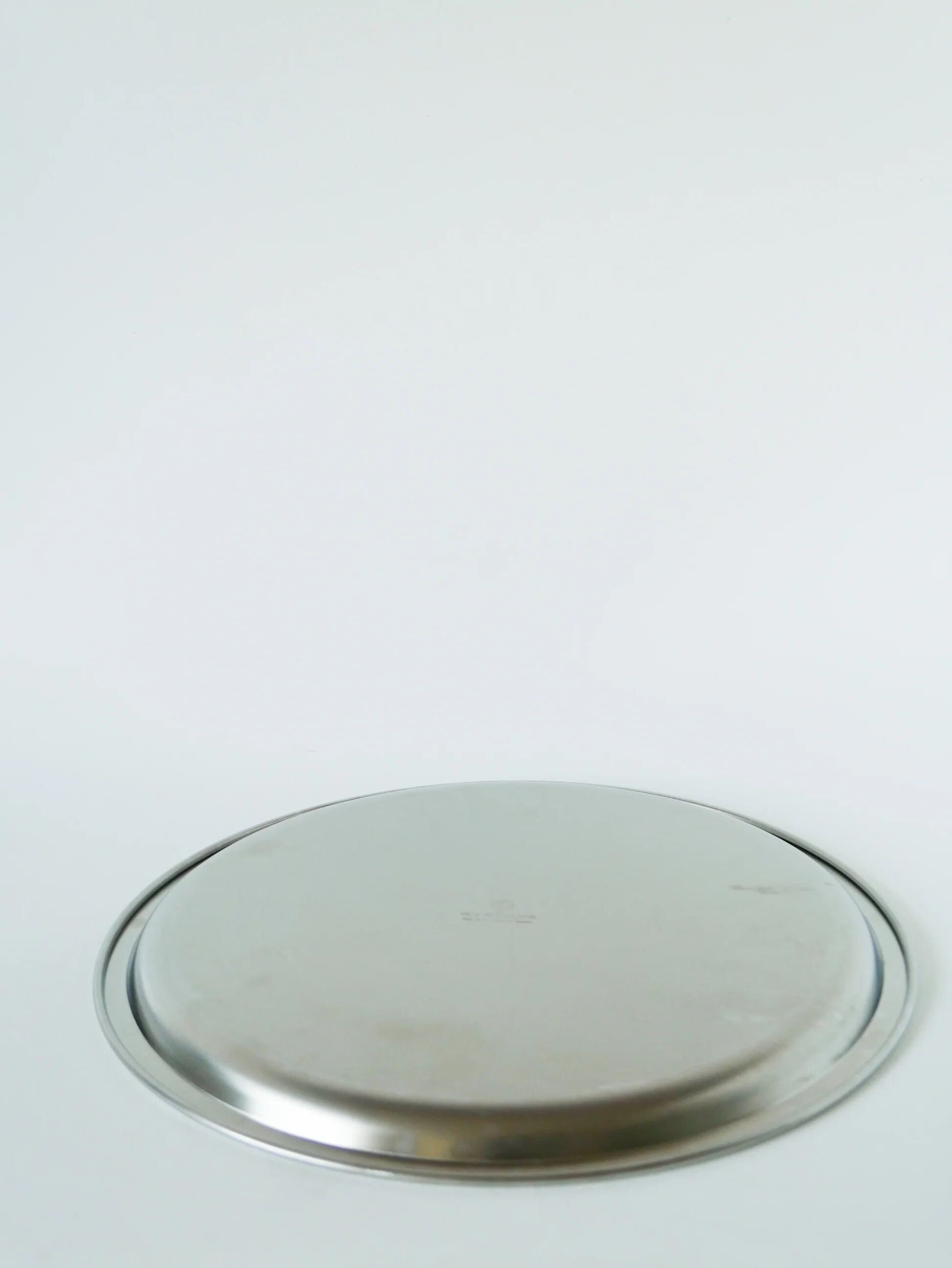Large round stainless steel platter, Guy Degrenne, 1970