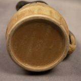 Barrel pitcher in beige enameled stoneware