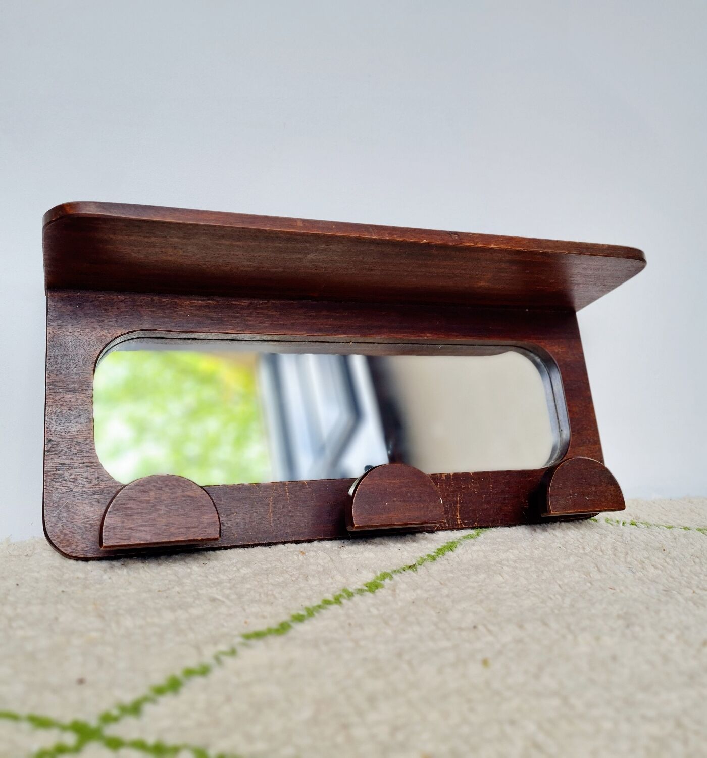 Antique coat rack in mirror wood