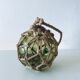 Antique fisherman's ball, old fishing floats