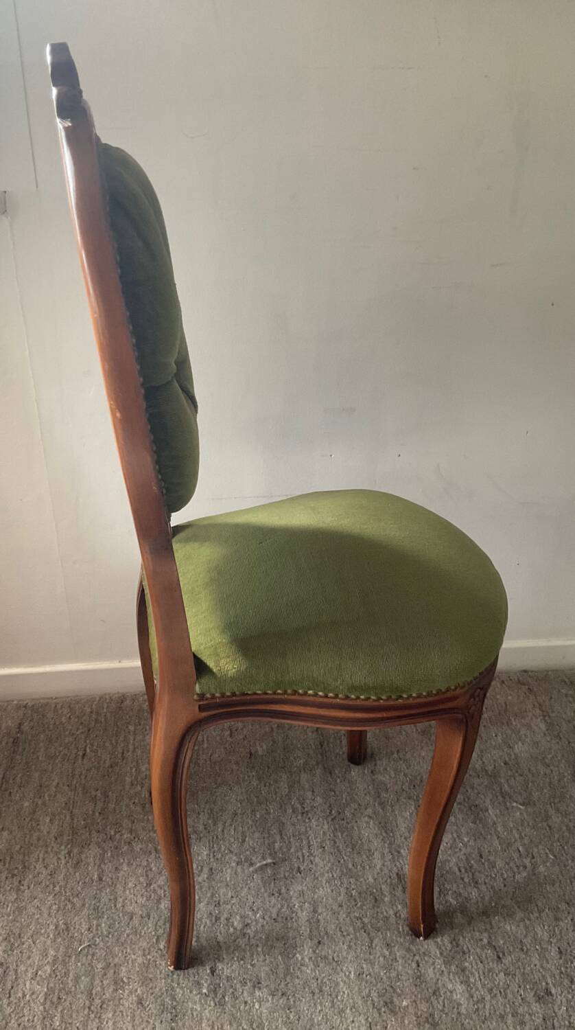 Antique wooden and velvet upholstered chair