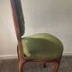 Antique wooden and velvet upholstered chair