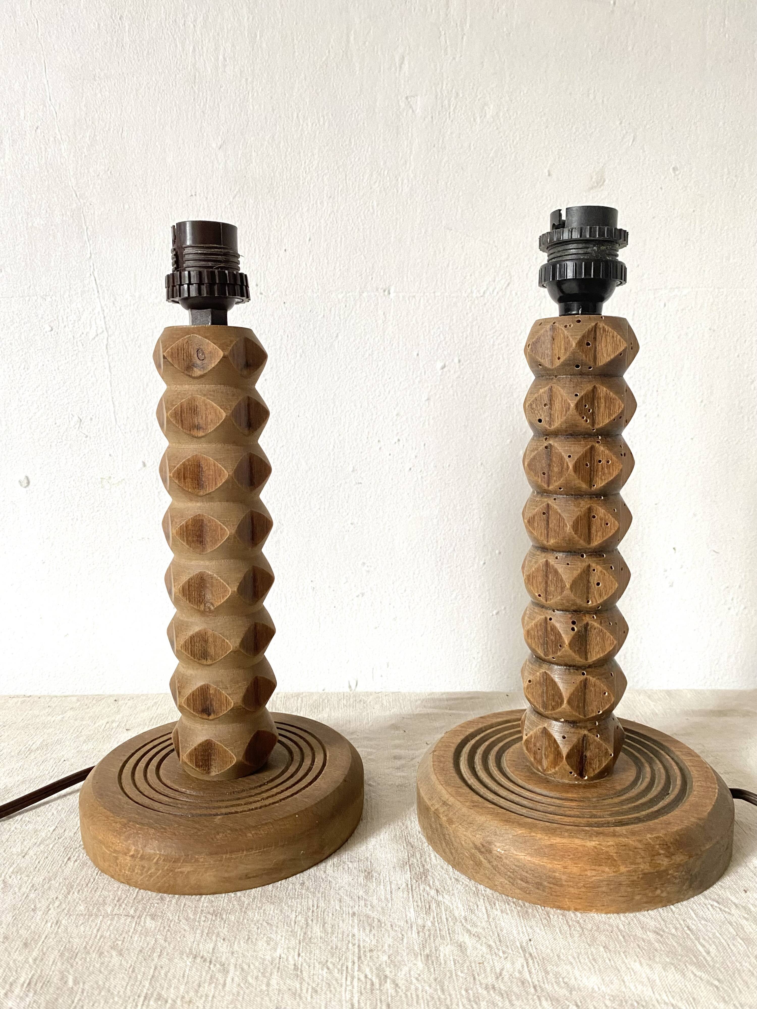 Pair of carved wood and macramé bedside lamps