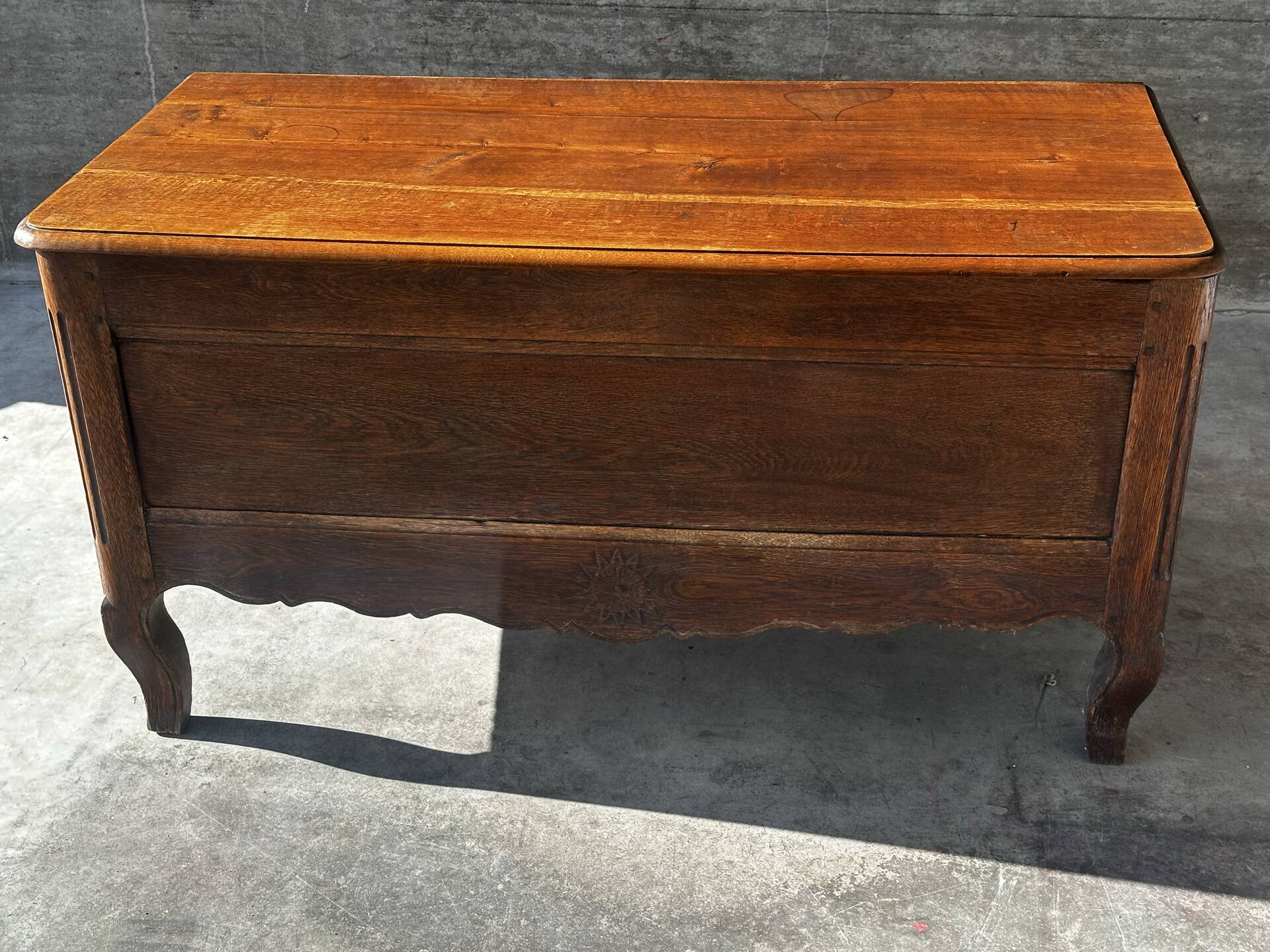 French provincial chest in carved and pegged solid oak, 18th century.