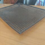 Perforated sheet metal tray circa 1950
