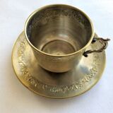 Silver metal cup and saucer