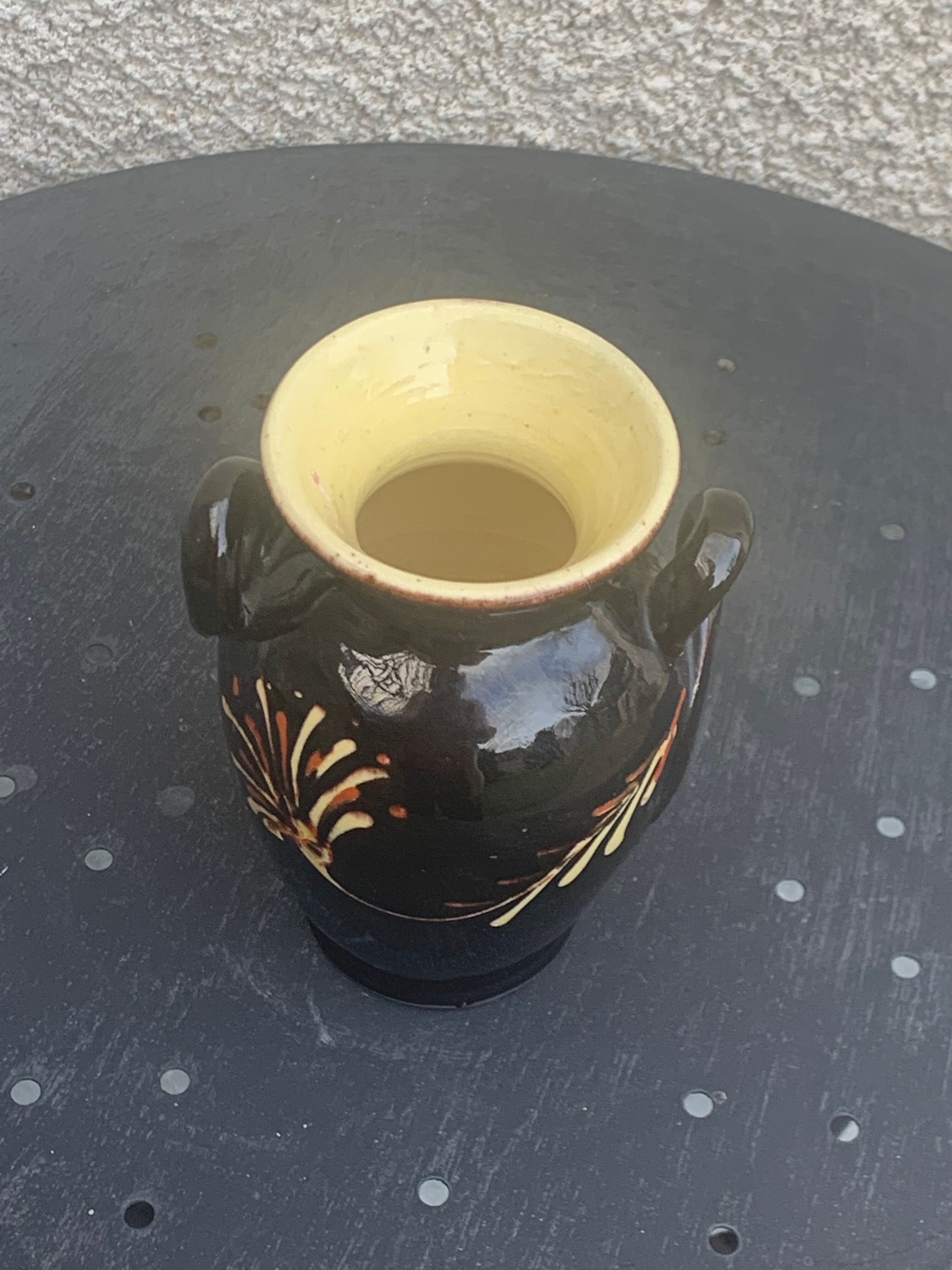 Vintage hand-painted yellow and black glazed ceramic amphora vase