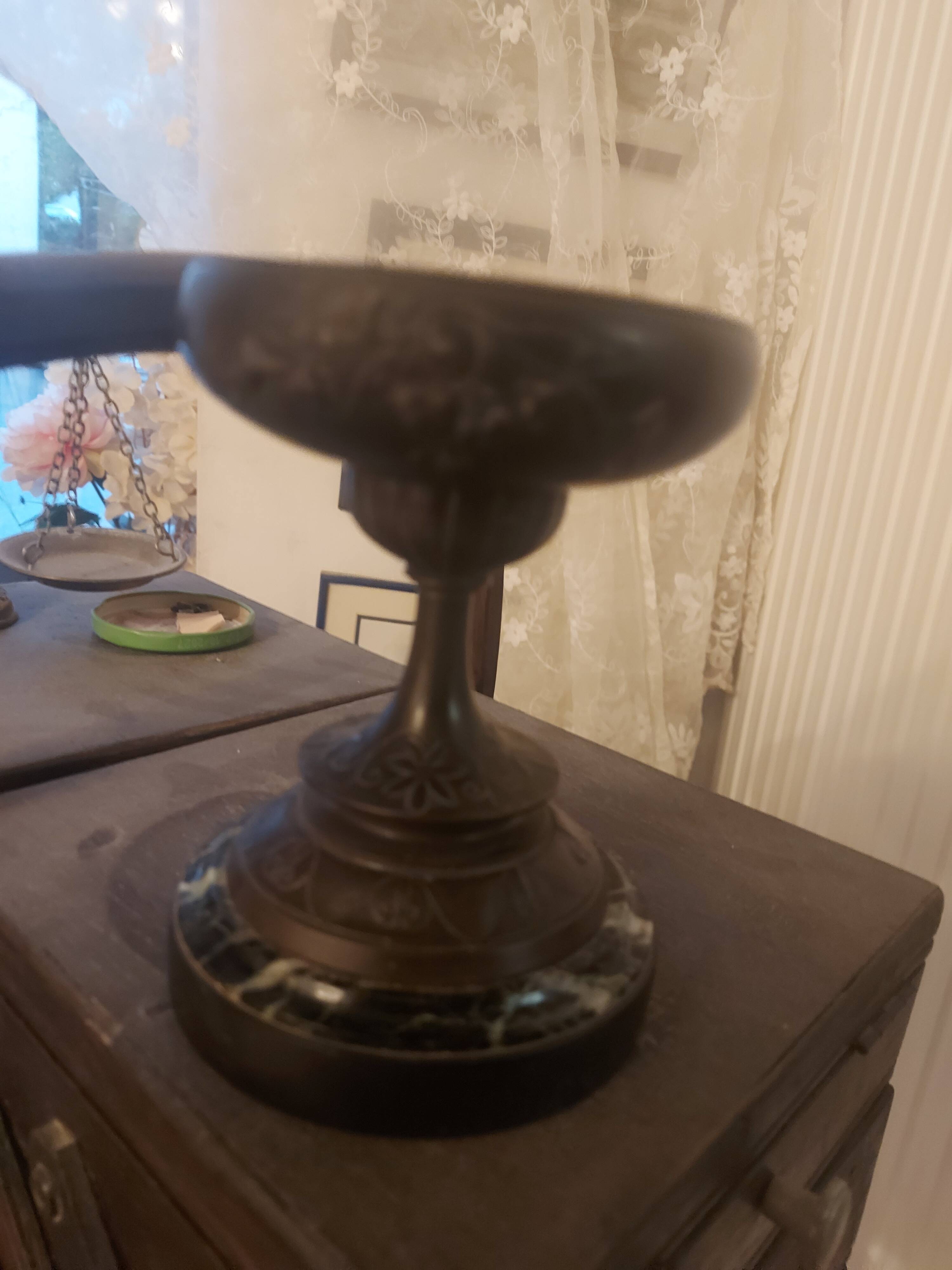 Bronze bowl on marble base