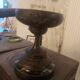 Bronze bowl on marble base