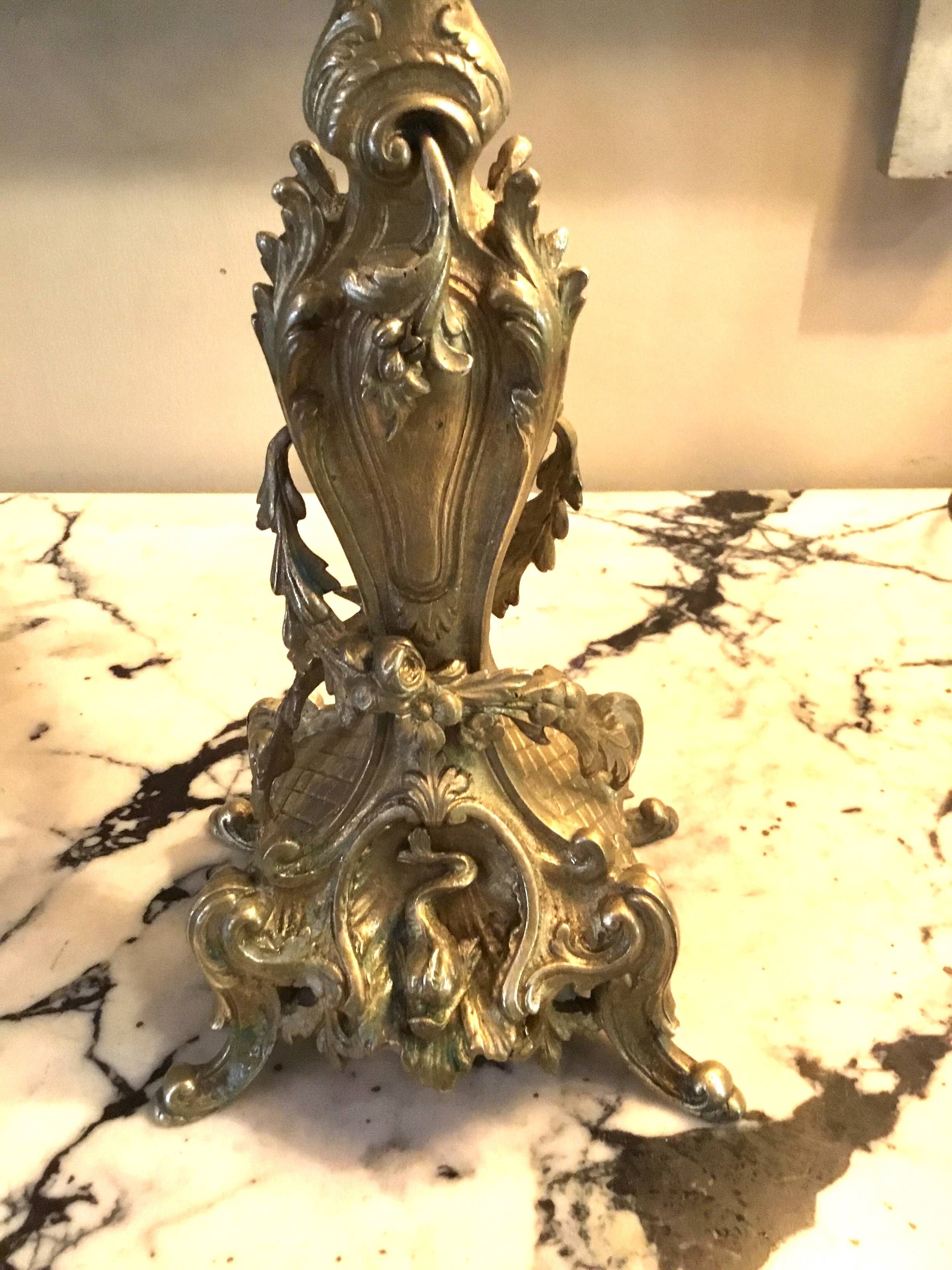 Pair of chiselled and gilded bronze candelabra from the 19th century.