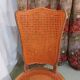 Caned chair in Louis XV style painted orange.