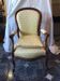 Louis Philippe style XIX century armchair with a violet backrest.