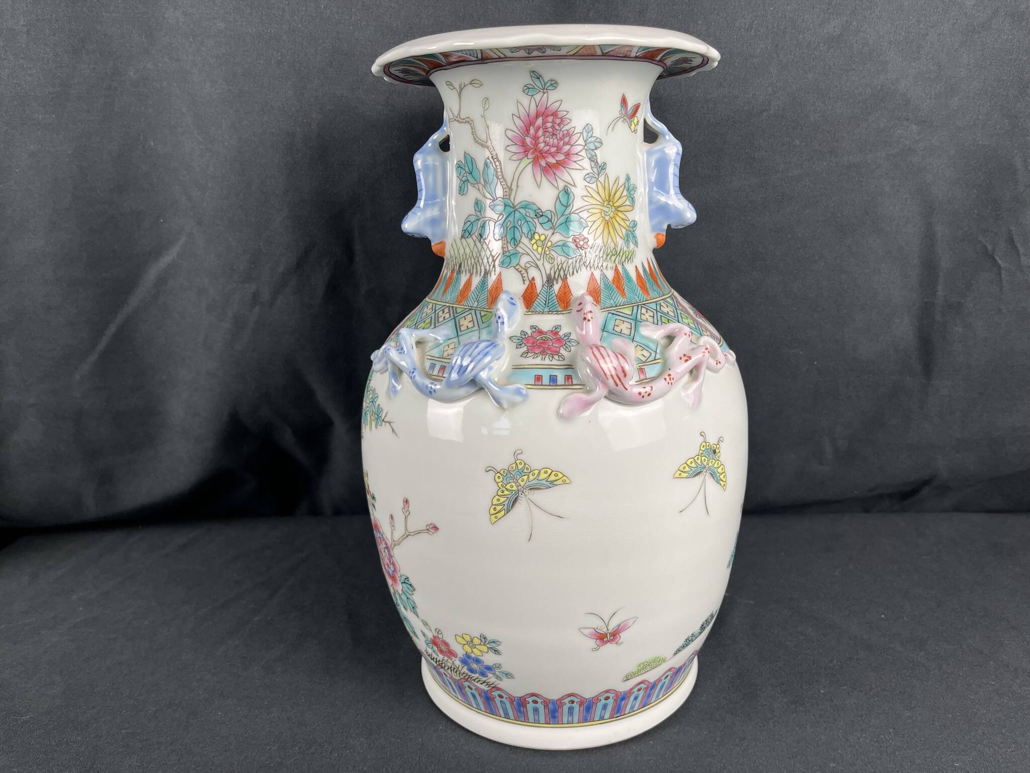 China, polychrome porcelain vase with relief decoration, 20th century