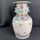 China, polychrome porcelain vase with relief decoration, 20th century