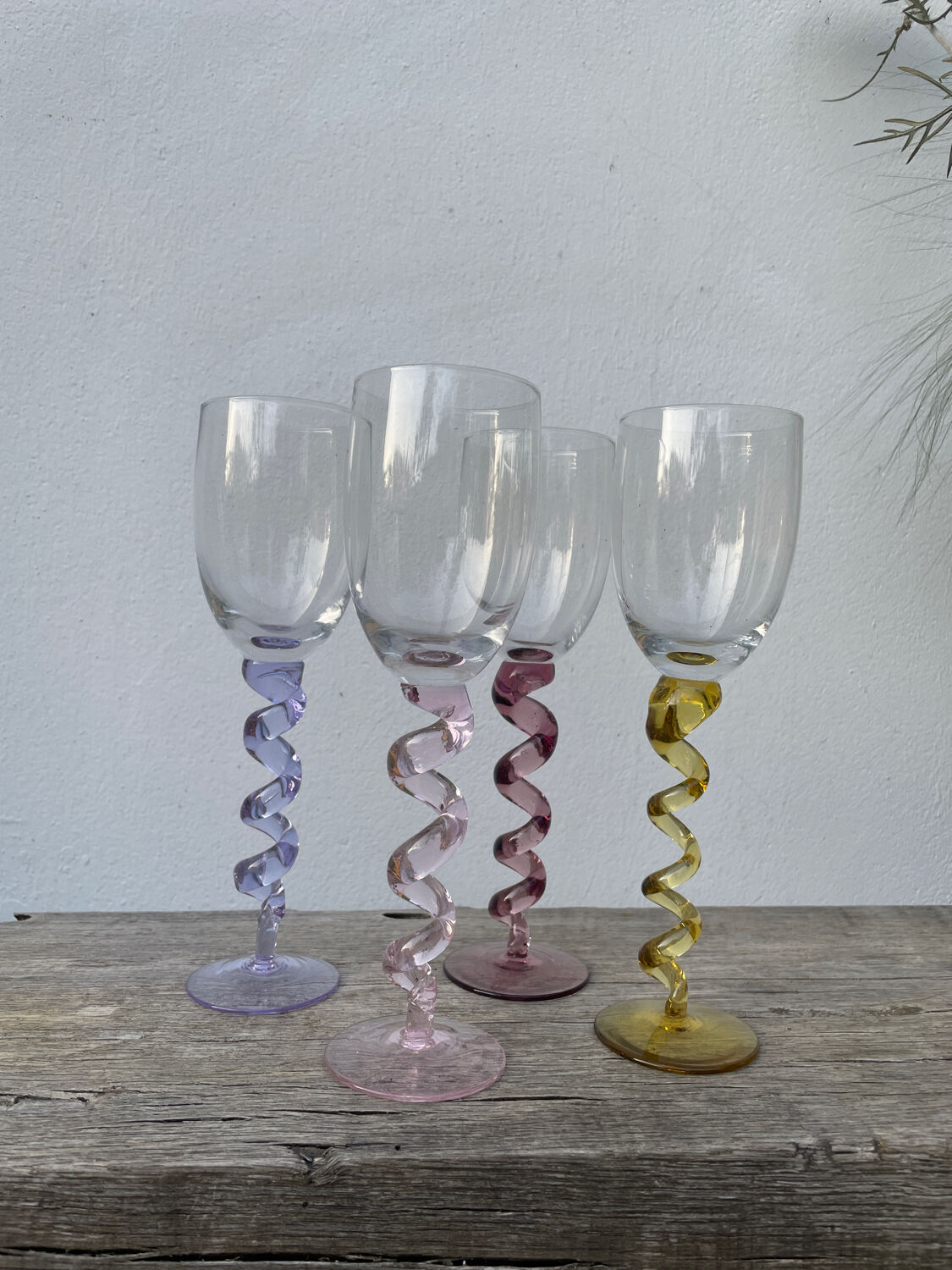 4 large, multicoloured, twisted champagne flutes