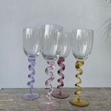 4 large, multicoloured, twisted champagne flutes