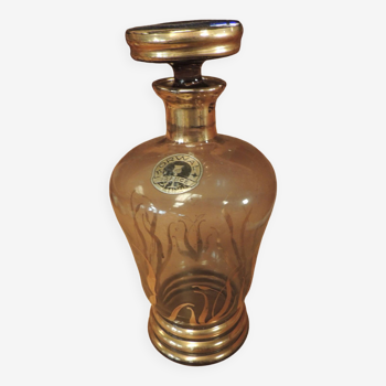 Smoked glass carafe and gold patterns