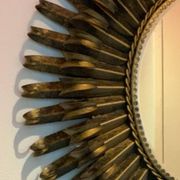 Golden iron star-shaped mirror, mid-1900s.