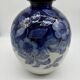 Large Tharaud Limoges vase in cobalt blue porcelain with floral decoration.