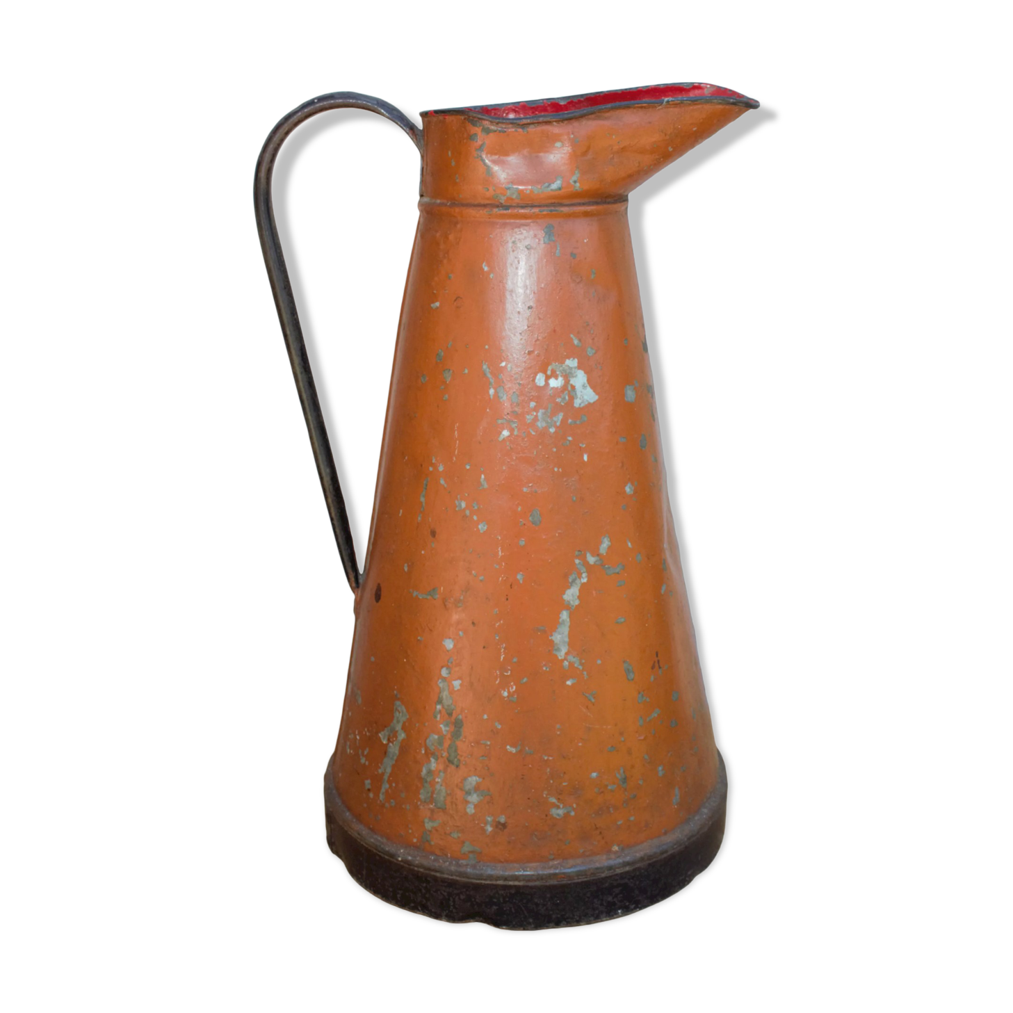 Old brown metal pitcher from France