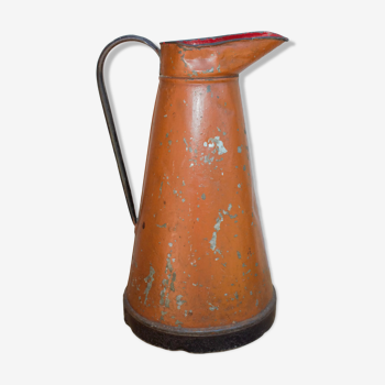 Old brown metal pitcher from France