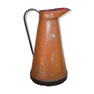 Old brown metal pitcher from France