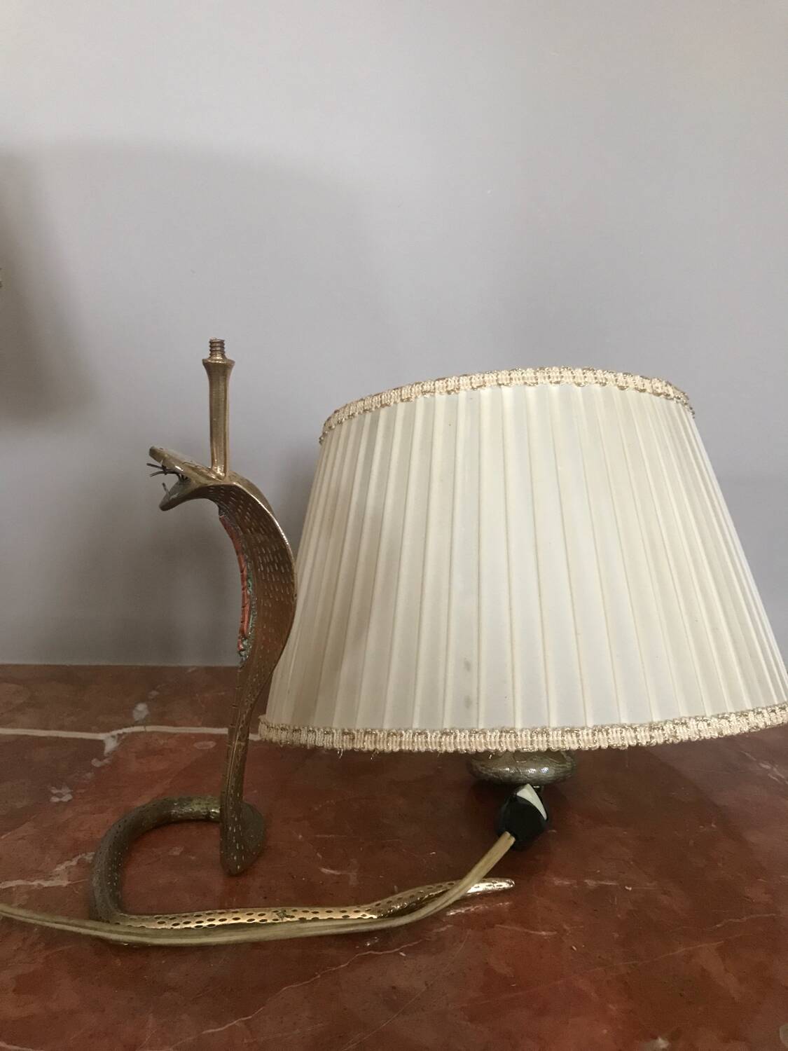 Magnificent pair of cobra bedside lamps