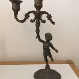 Pair of Cherub candlesticks.