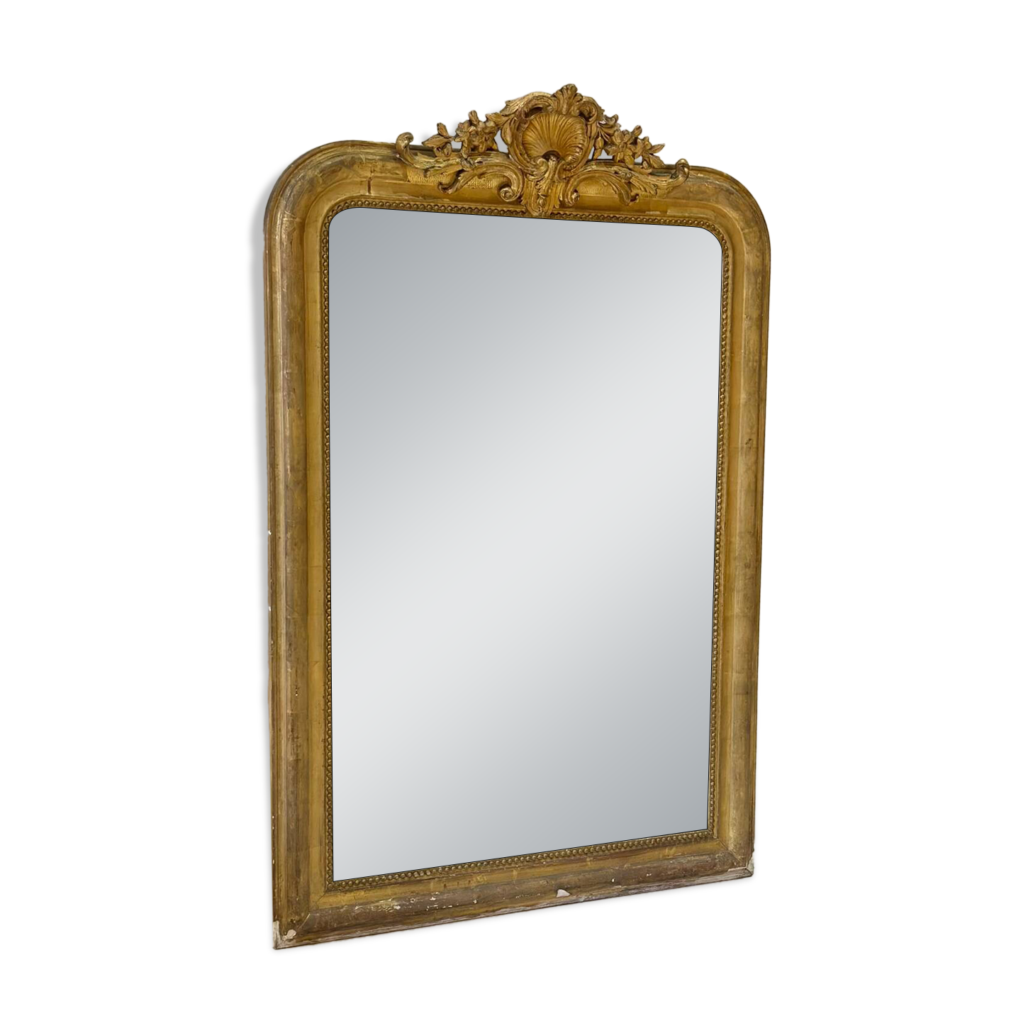 Antique Louis-Philippe mirror carved and gilded with leaf