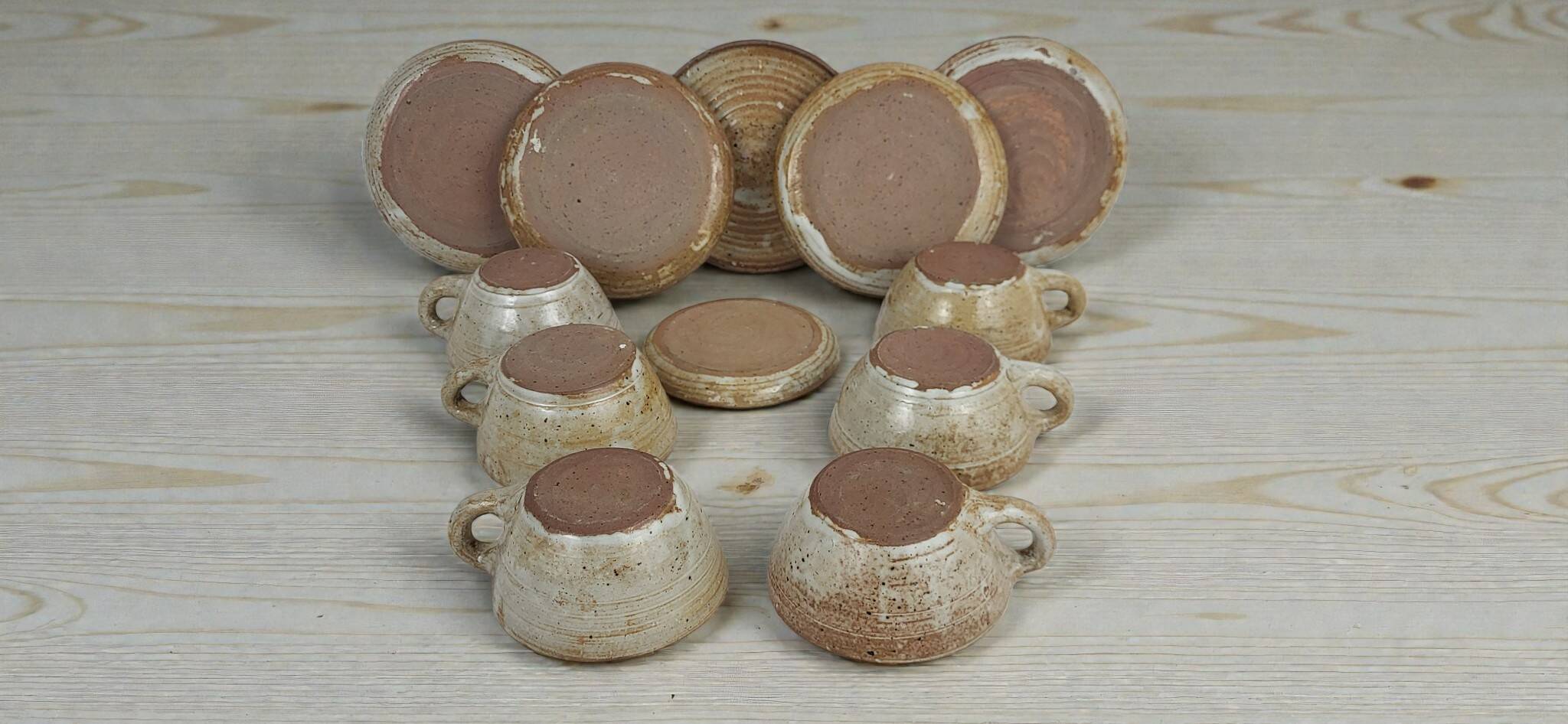 6 stoneware cups and saucers by Pierre Lion