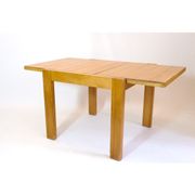 Table à manger en pin à rallonges des années 1980.