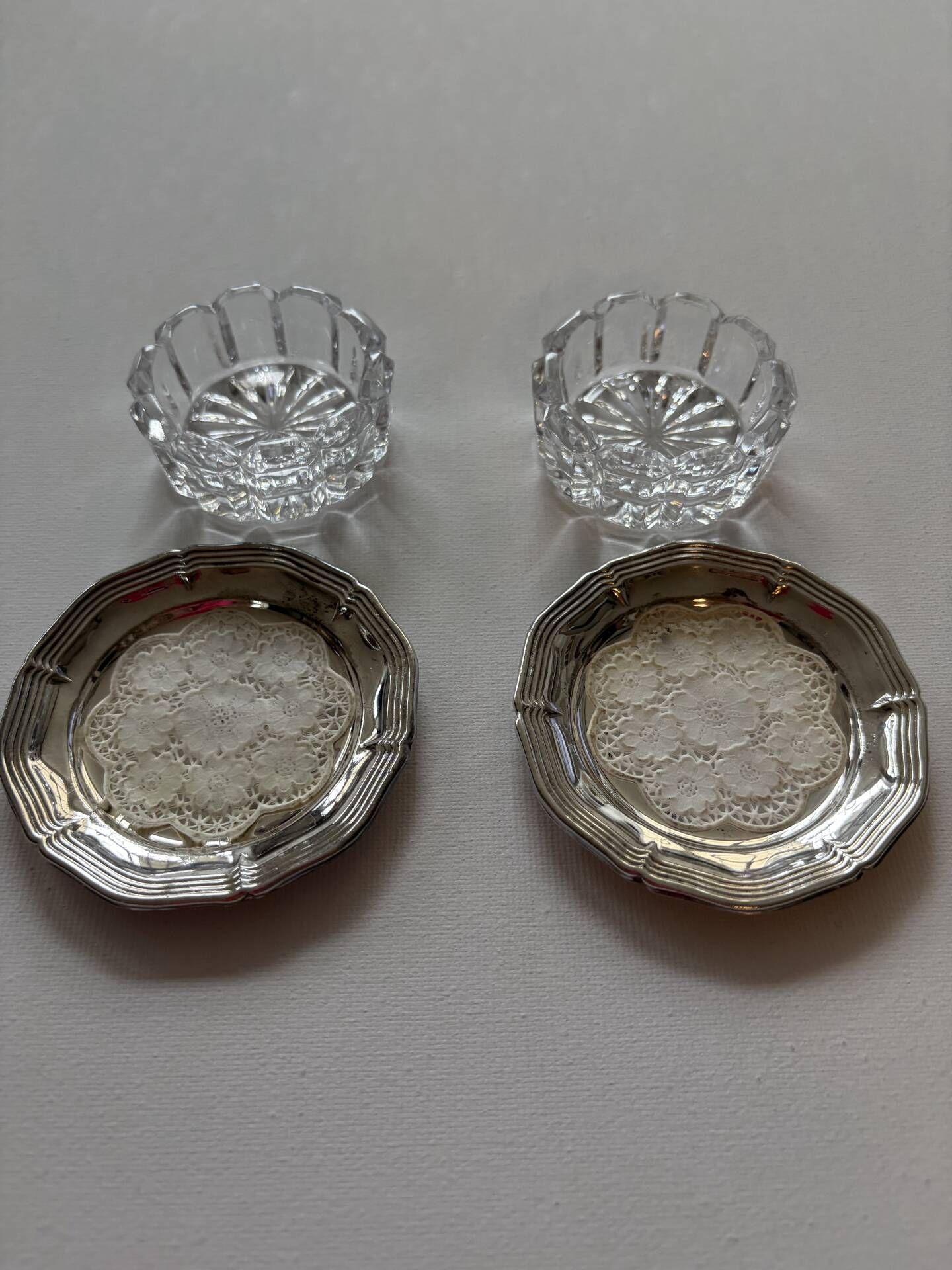 Crystal and silver-plated salt and pepper shakers