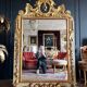 Italian mirror from the Napoleon III period in painted and gilded wood
