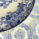 Set of 8 blue earthenware dinner plates with floral and bird decoration, 20th century