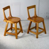 Pair of brutalist wooden back stools. France, circa 1960