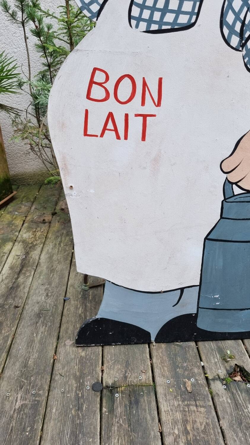 Very large old advertising panel or sign