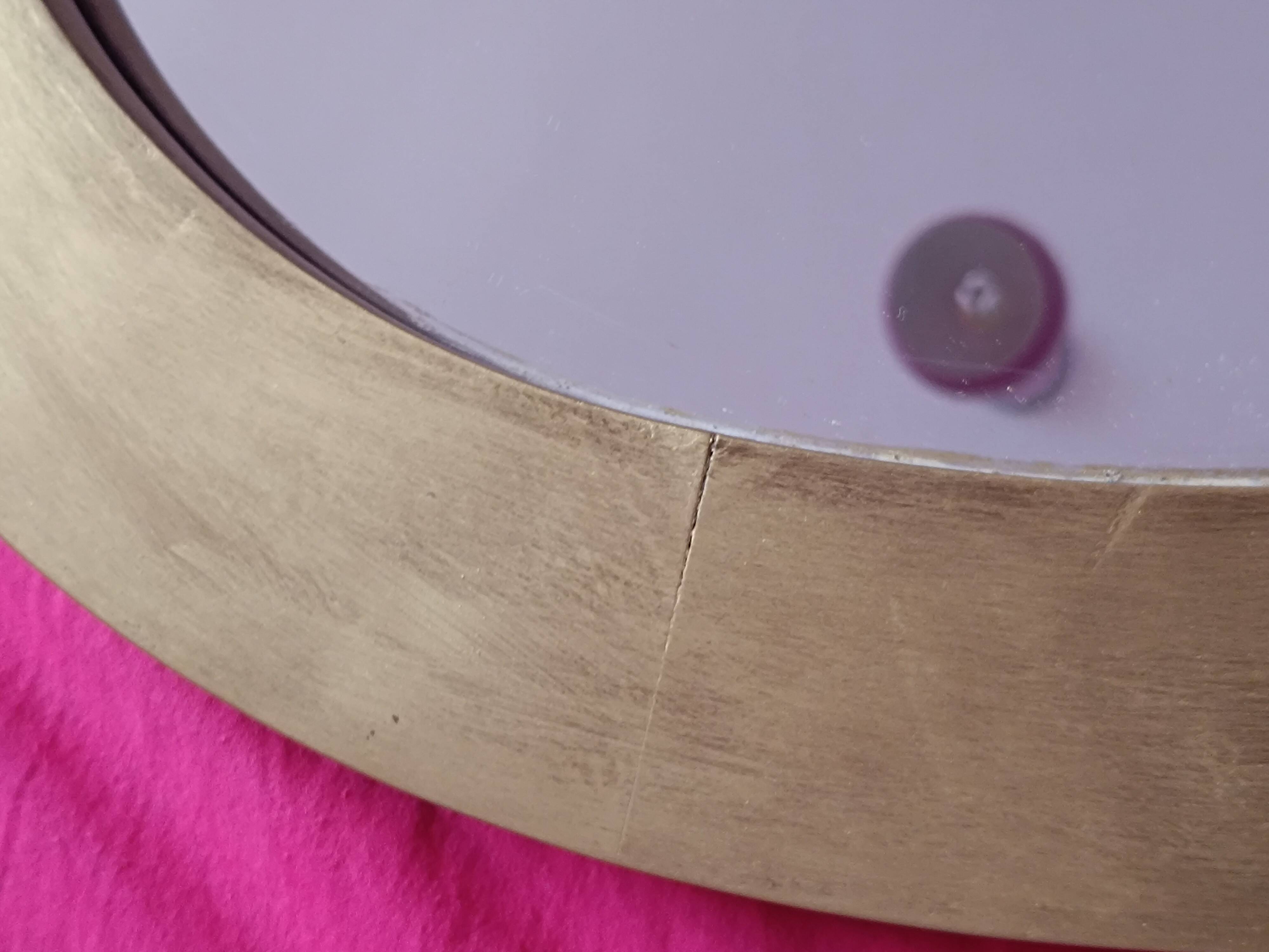 Miroir ovale en bois doré