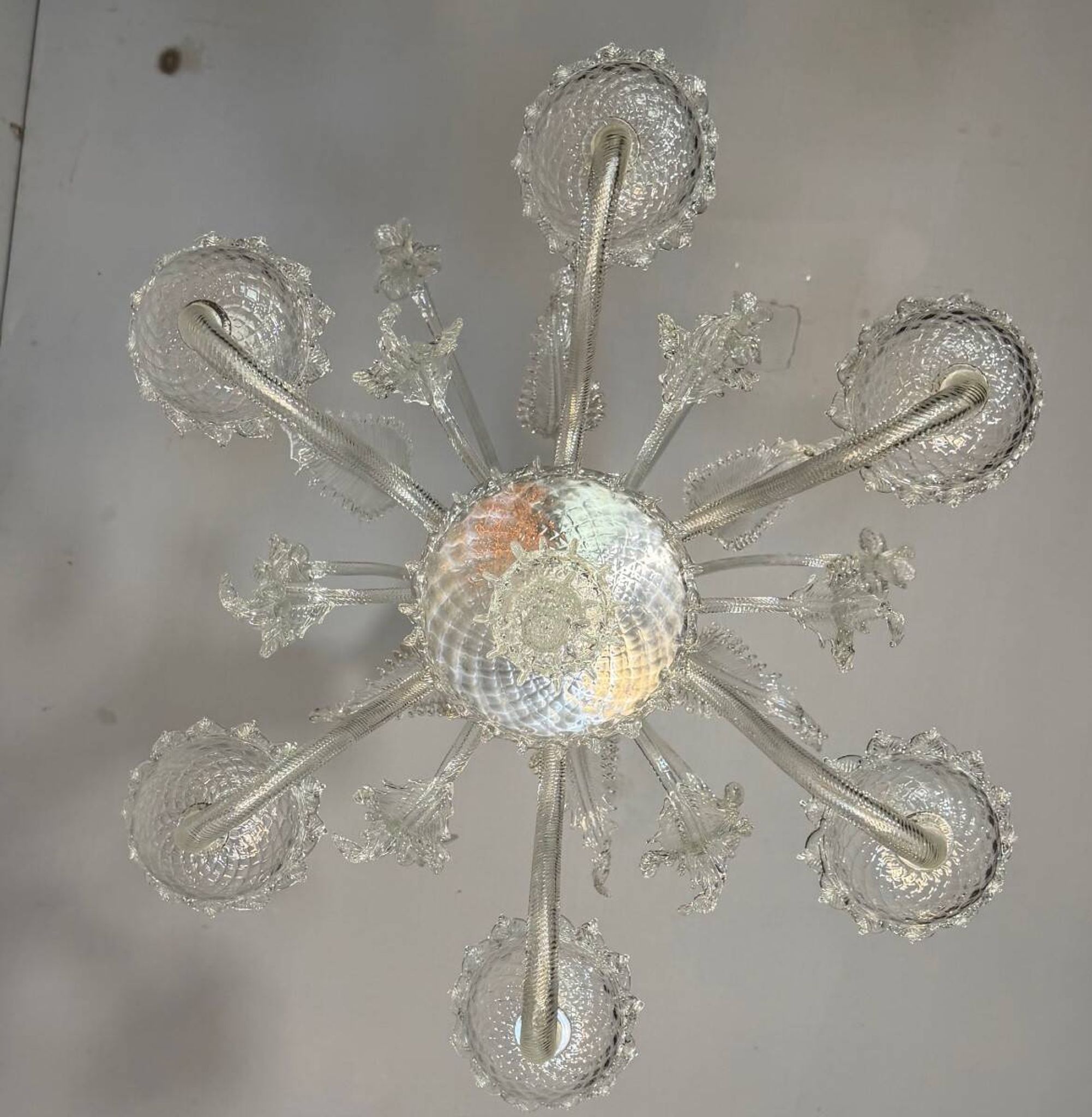 Venetian chandelier made of Murano glass, six light arms, circa 1940.